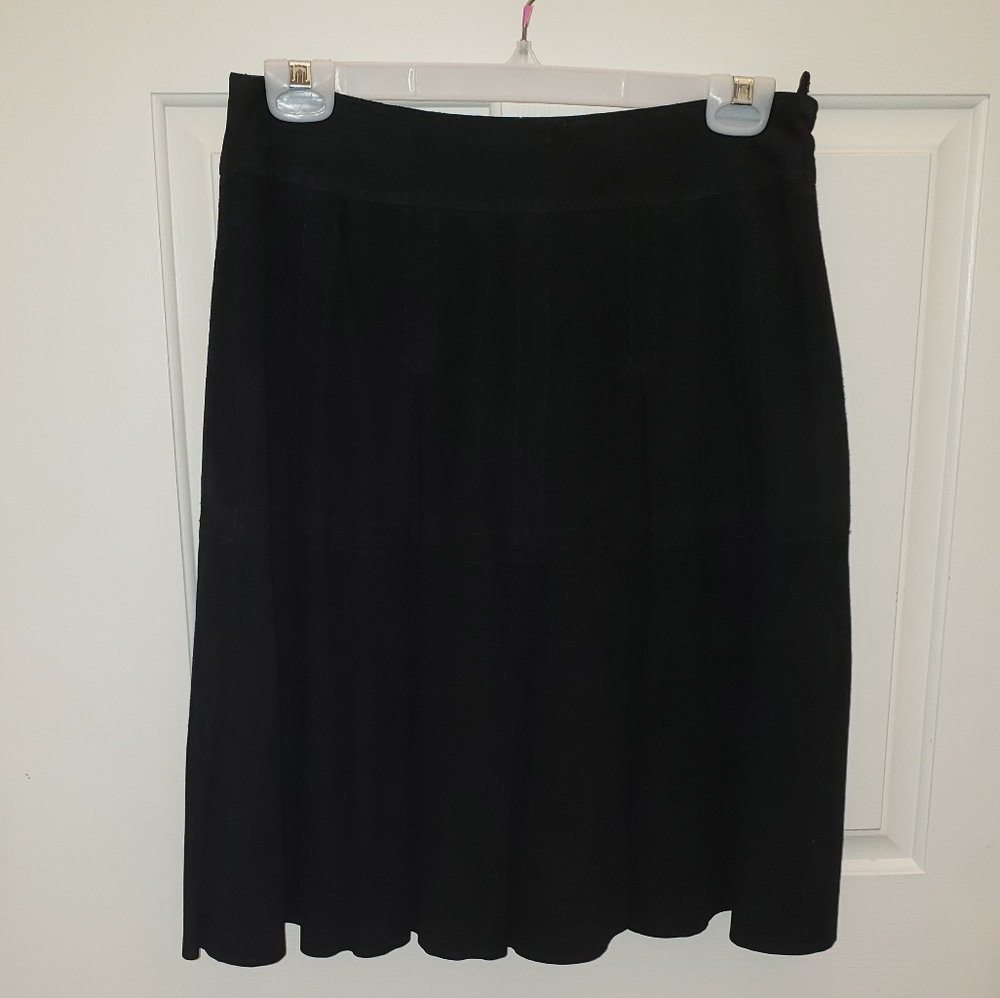 IT'S SUEDE! It's a great skirt!